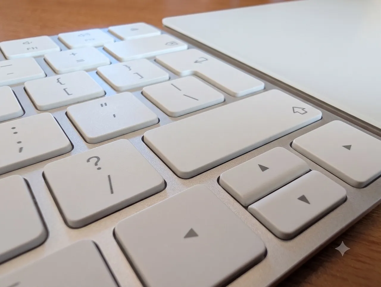 A photo of my keyboard and track pad - cleaned up with Gemini